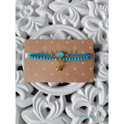 setje in turquoise-blauw met ovaal tussenstuk setje in turquoise-blauw met ovaal tussenstuk